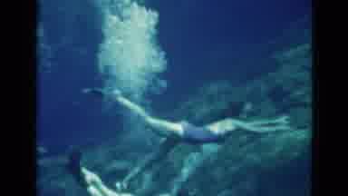 Florida USA (1952): A Woman With Flippers And Goggles Swims Underwater In The