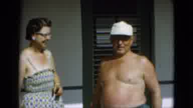 Quebec Canada (1952): Woman In Dress And Shirtless Man Are A Happy On A Relaxing