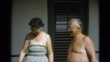 Quebec Canada (1952): Smiling Mature Woman Walks Away From Shirtless Elderly Man