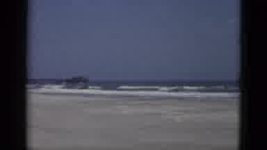 Quebec Canada (1952): View Of White Building Beach And Blue Sea Surf On A Bright