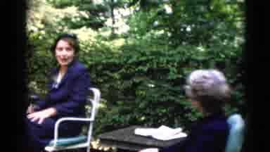 Washington DC USA (1952): Adults Having A Conversation On A Patio Switches To