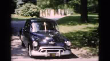 Washington DC USA (1952): A Group Of People Riding In An Old Antique Car