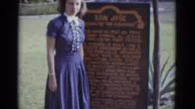 New Orleans USA (1952): Blue Dress Girl Standing Next To San Jose Sign In Grass