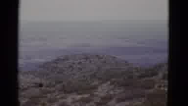 Utah USA (1952): Pan Across The Landscape Of A Cold Mountain Range Behind Snow