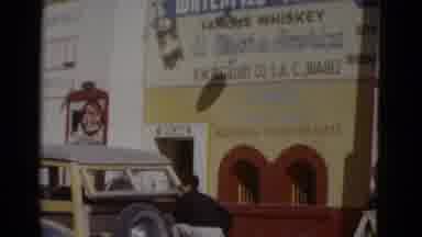 Baja California Mexico (1952): A Man Riding A Horse While Two Other Men Work On