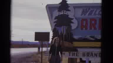 BAJA CALIFORNIA MEXICO-1952: One Lady Poses at Welcome to Arizona Sign