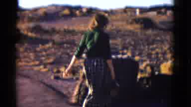 Arizona USA (1952): A Walking Through The Dry Rocky Mountains In Dress Up Clothes