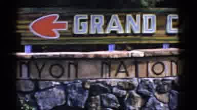 Arizona USA (1952): Man Standing Next To A Sign With Directions To The Grand