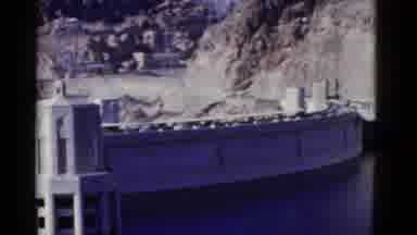 California USA (1952): Exterior Of Hydro Dam Against Grey Rock Formation With