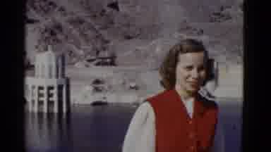 California USA (1952): Girl By The River Standing For A Picture Being Taken Of Her