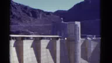 California USA (1952): A Structure Of A Building With Two People Looking Over