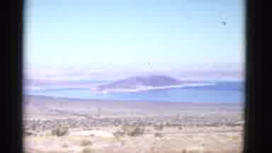 California USA (1952): Woman Passes By Driving Beautiful Car On The Road With