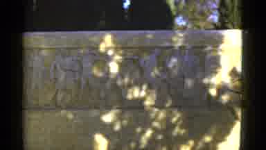 California USA (1952): Hieroglyphs Of Different People On A Large Stone Outside On