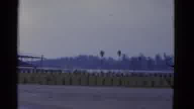 California USA (1952): Woman Exits A Nineteen Forties Car In Skirt And Jacket With