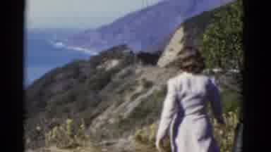 California USA (1952): A Woman On Mountains With A View Of The Ocean