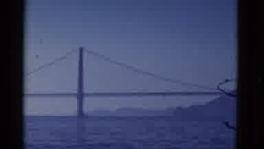 San Francisco California (1952): A Bridge Spans A Large Body Of Water To A