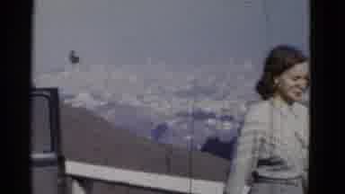 San Francisco California (1952): Panorama Of Winter Mountains As Woman Walks In