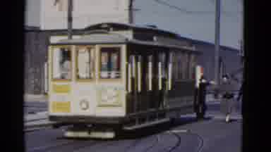 San Francisco California (1952): People Getting On A Trolly Near A Marketplace