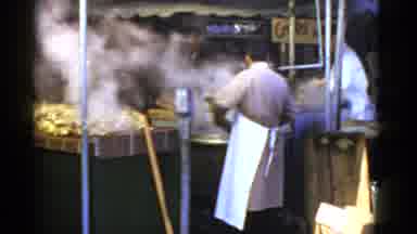 San Francisco California (1952): People Cooking In Kitchen While Man Walks Past