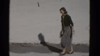 San Francisco California (1952): Well Dressed Woman Walks Up The Walkway As Camera