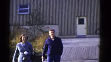 San Francisco California (1953): Man And Woman Happily Walking Away From Building