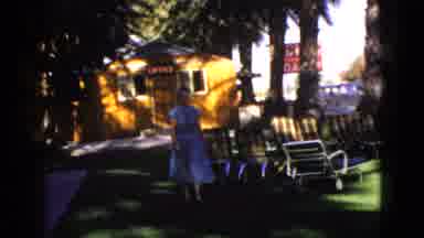 Palm Desert California (1953): Woman Walks From Office Of A Forties Era Motel With