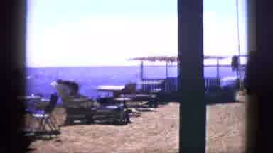 Palm Desert California (1953): Describe The People Place And Action In The Video