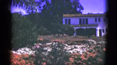 Palm Springs California (1953): White Building With Garden Of White Pink And