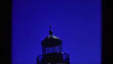 California USA-1953: External View Of Church On Top Of A Hill With Lighthouse And City View