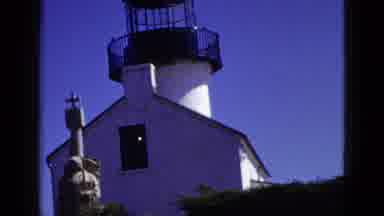 California USA-1953: Lighthouse And Church Combined With Stone Statue