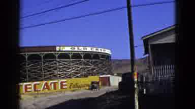 California USA (1953): Camera Panning Across Screen Showing Old Town And Mountain