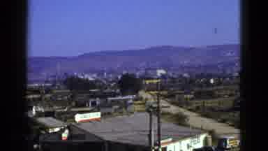 California USA (1953): Mountain Foothills Beneath A Clear Blue Sky On A Warm