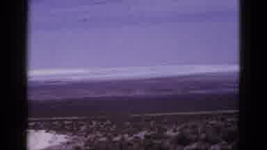 California USA (1953): Camera Scanning Non Populated Roads Looking At The Clouds