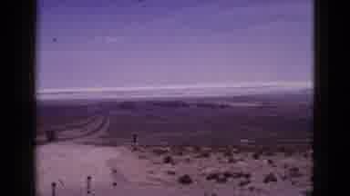 California USA (1953): Incredible Panning View Of A Two Lane Road Running Through