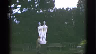 California USA (1953): Men And Women Enjoy Sculptures In A Beautiful Outdoor Area