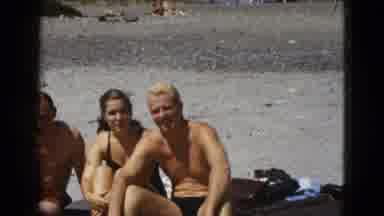 California USA (1953): Friends Relaxing On The Beach