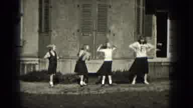Milwaukee Wisconsin (1953): Four Girls Dancing In Front Of A House With A Little