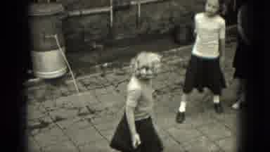 Milwaukee Wisconsin (1953): Two Girls Jump Roping With One Side Of Jump Rope Tied