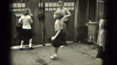 Milwaukee Wisconsin (1953): A Little Childs Are Playing With Skipping They Enjoy