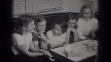 Milwaukee Wisconsin (1953): A Group Of Female Children Sitting On A Couch Together