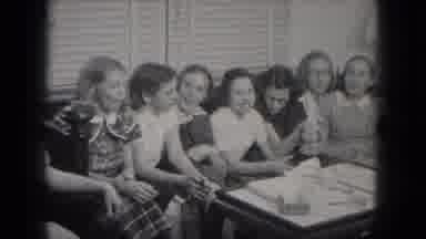 Milwaukee Wisconsin (1953): Group Of Kids Gather Around Within A Happy Environment