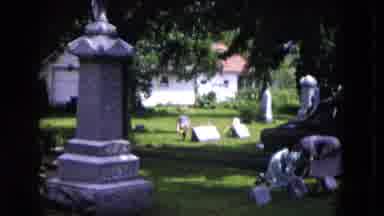 Milwaukee Wisconsin (1953): Two Women Clean Up Around The Headstone Of A Loved One