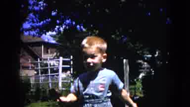 Milwaukee Wisconsin (1953): Little Kid Running In The Backyard Toward Camera With