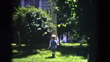 Milwaukee Wisconsin (1953): Young Child With Shirt And Shorts Playing In A Park In