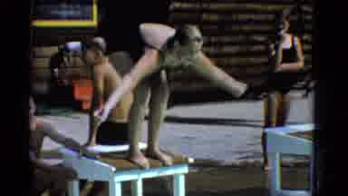 Yonkers New York (1953): Girl In Black Swimsuit Braces For Jump At Edge Of Board