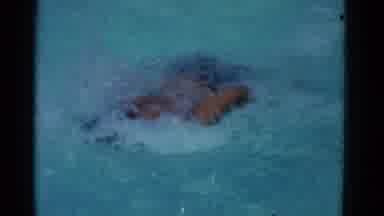 Yonkers New York (1953): Black Boy With Short Hair Swimming Breast Stroke Quickly