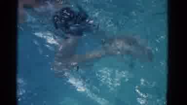 Yonkers New York (1953): A Boy Is Swimming From One Side Of The Swimming Pool To