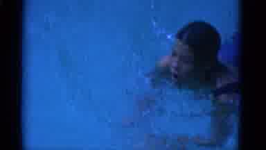 Yonkers New York (1953): A Woman Is Swimming In A Pool And Practicing Her