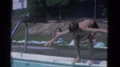 Yonkers New York (1953): A Boy Pauses Before Bending Diving And Swimming Through