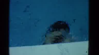 Yonkers New York (1953): Woman In One Piece Bathing Suit Swims Laps On The Pool By